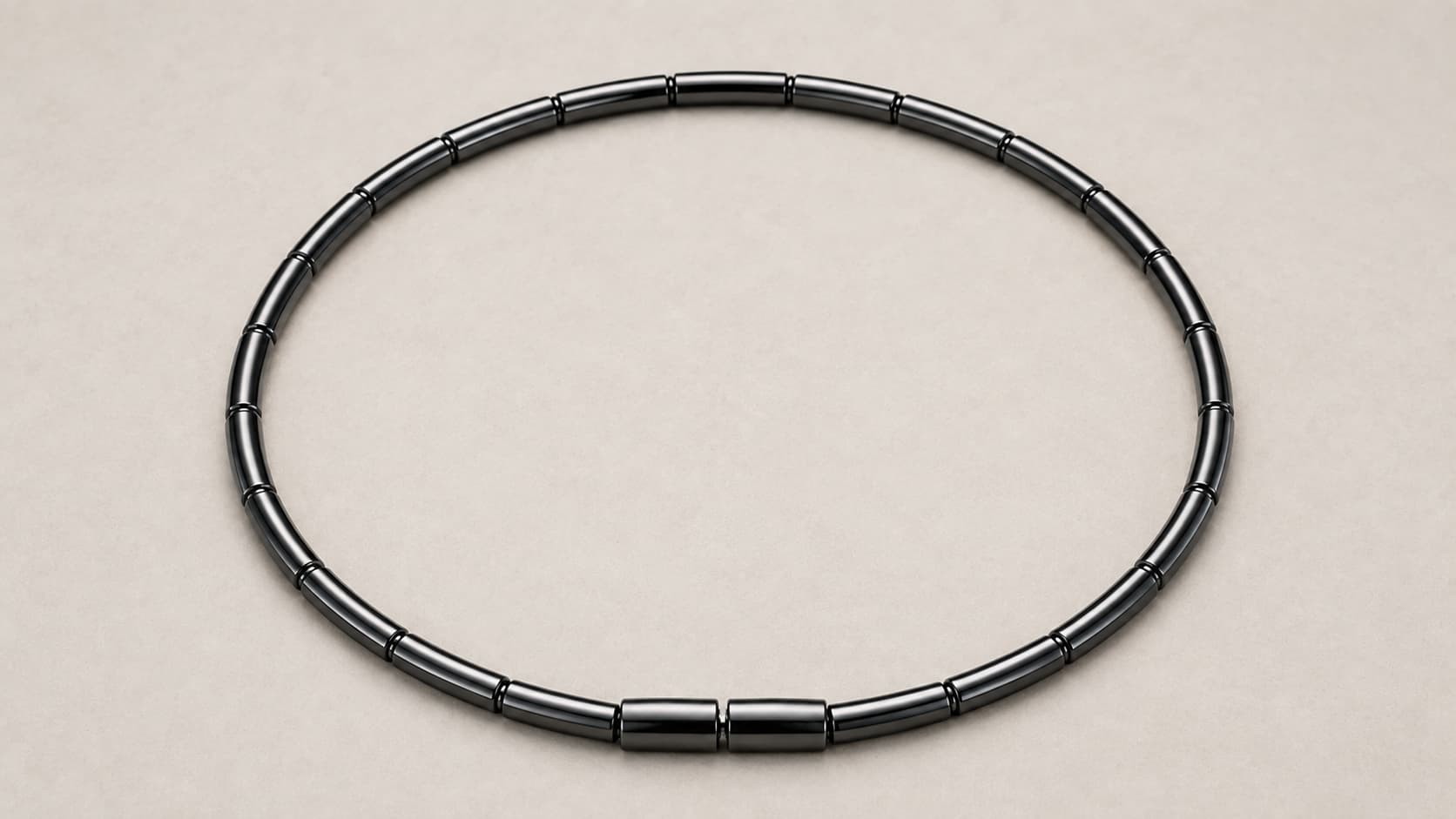 Magnetic hematite necklace with dark polished beads and a magnetic clasp