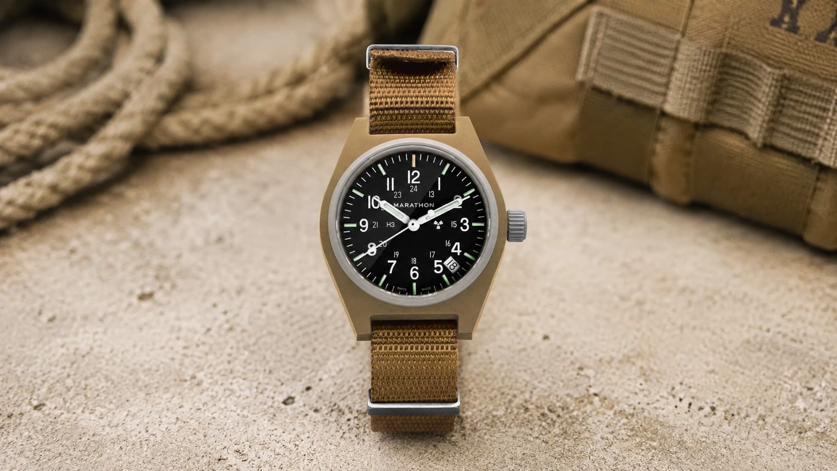 Marathon 34mm Desert Tan GPQ field watch with date on tan NATO strap