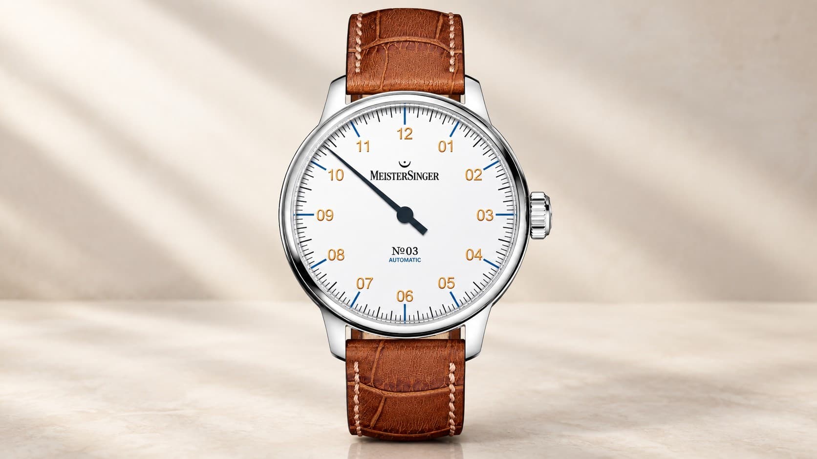 MeisterSinger N°03 white dial automatic watch with a single hand and brown leather strap