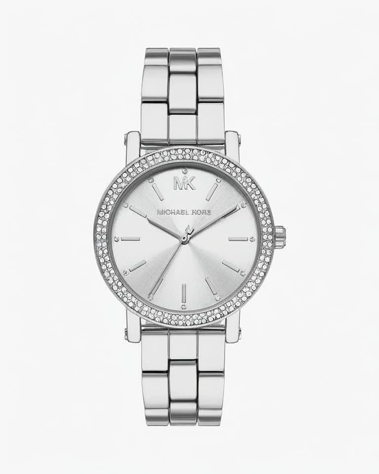 Michael Kors silver stainless steel watch with crystal-encrusted bezel and matching metal bracelet on white background