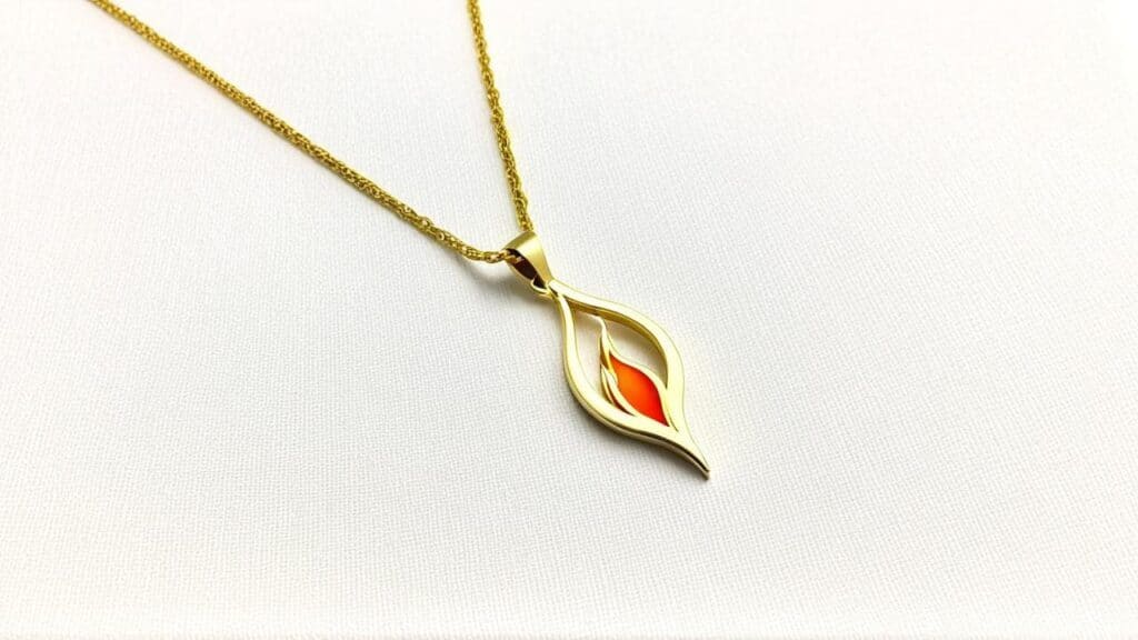 Modern gold flame-shaped pendant with orange enamel detail representing stylized fire element