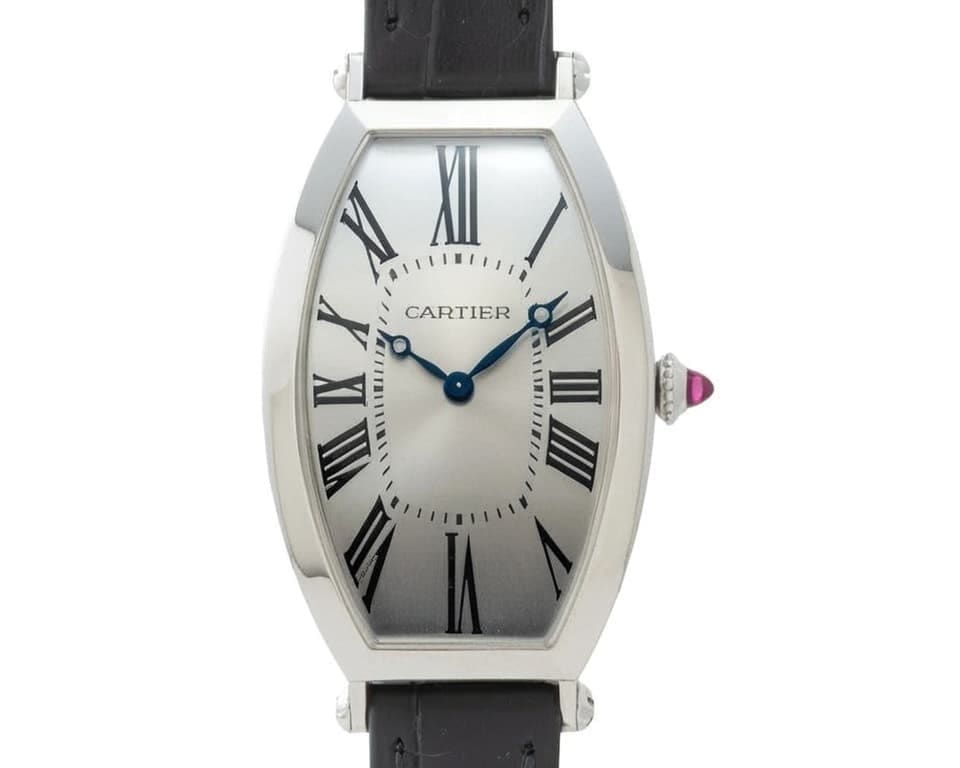 Cartier Tonneau in white gold with barrel case, Roman dial and blued hands