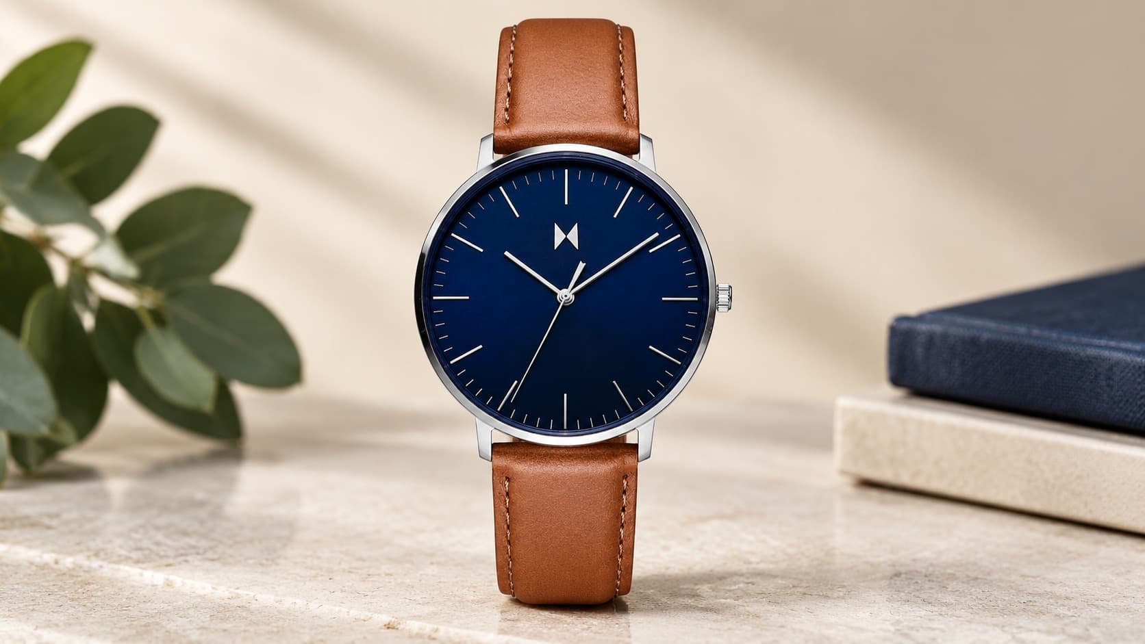 MVMT Legacy Slim watch with navy dial and tan leather strap