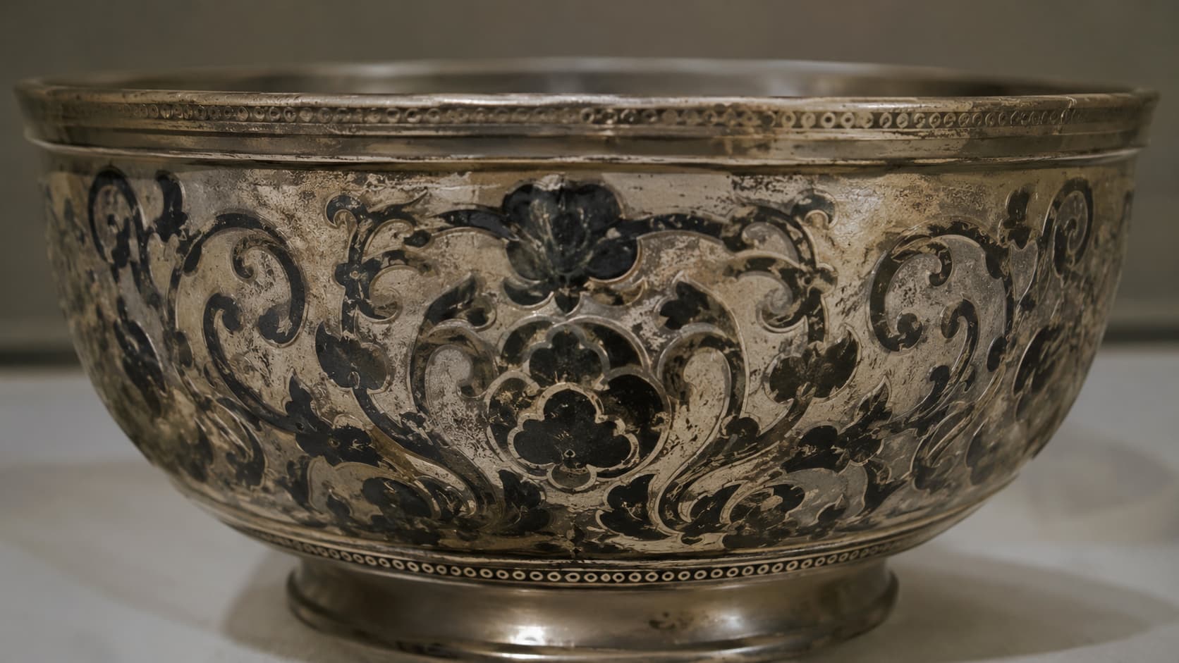 Antique silver bowl decorated with black niello inlay