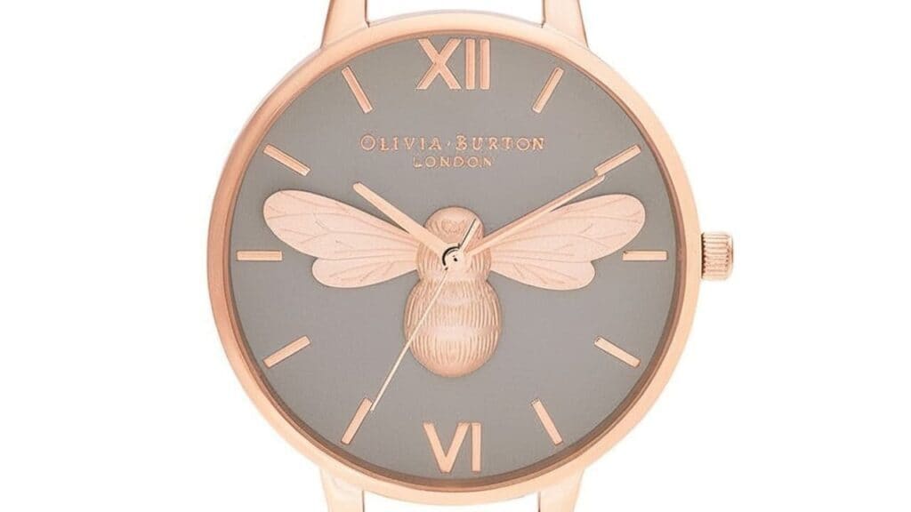Olivia Burton rose gold watch featuring signature 3D bee design on grey dial with Roman numerals