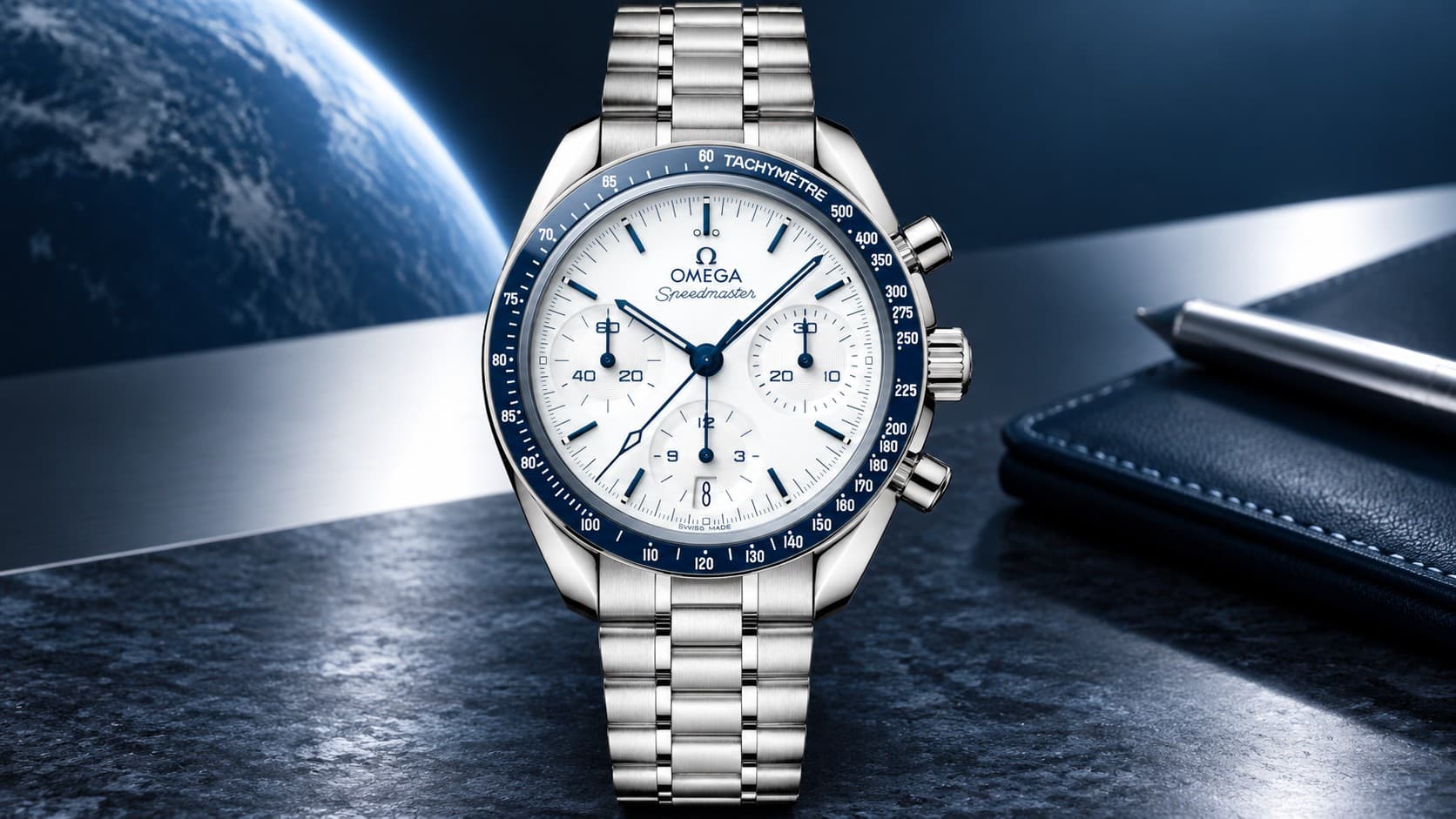 Omega Speedmaster 38 chronograph watch with blue bezel and steel bracelet