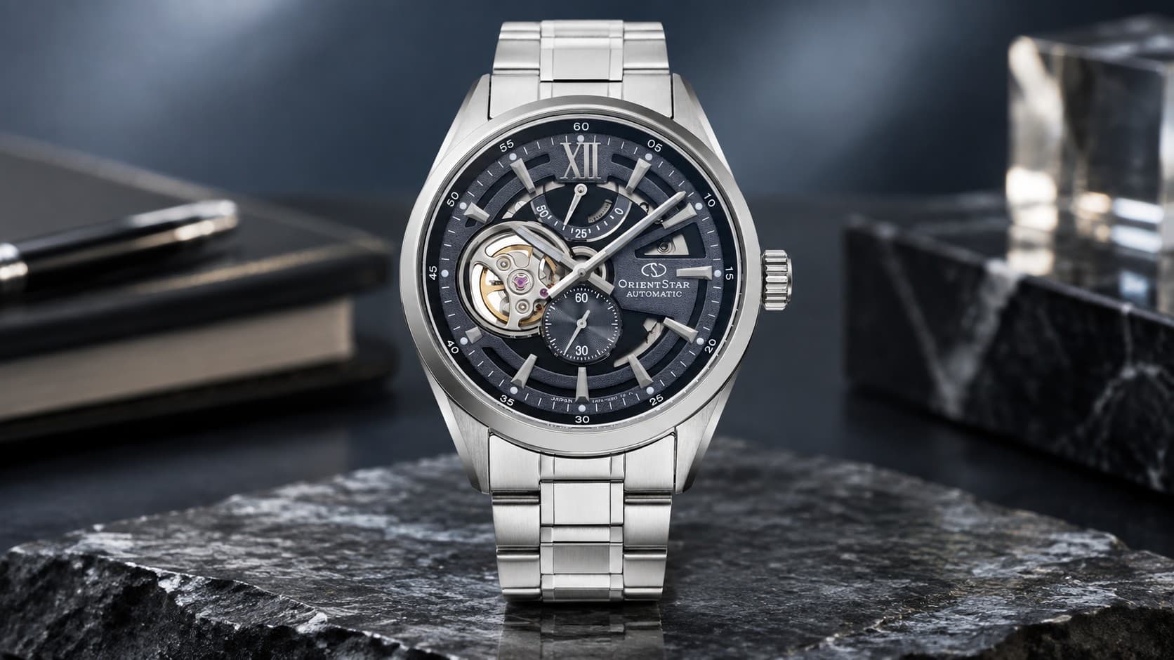 Orient Star Contemporary open heart skeleton watch with blue dial and steel bracelet