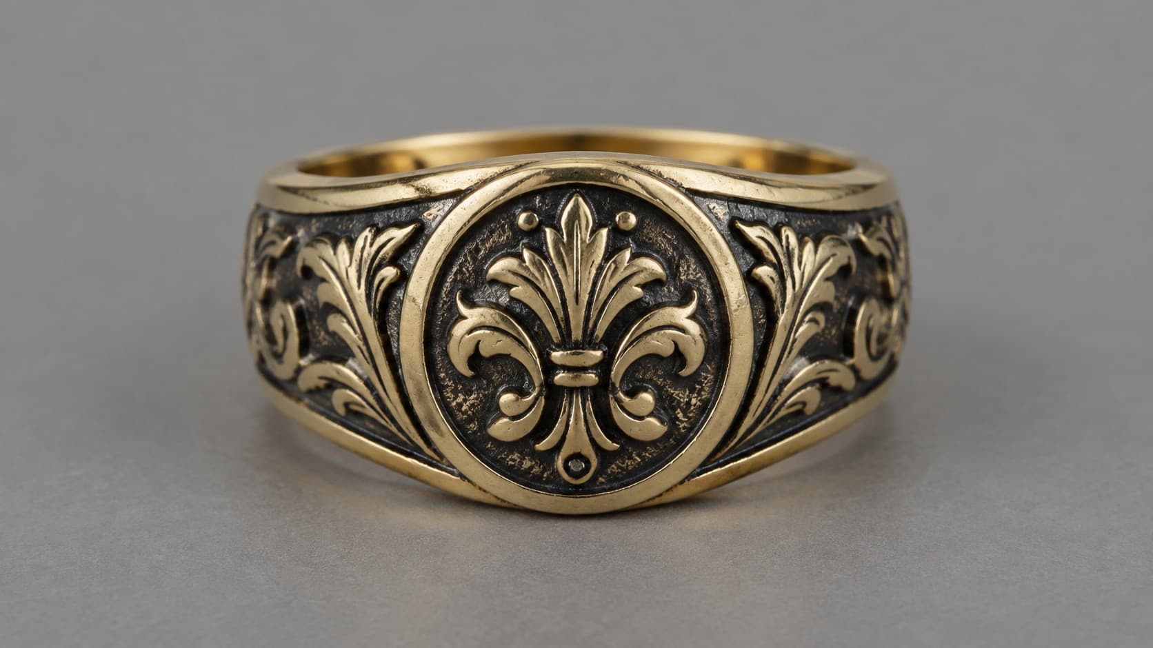 Gold ring with a dark oxidized antiqued finish