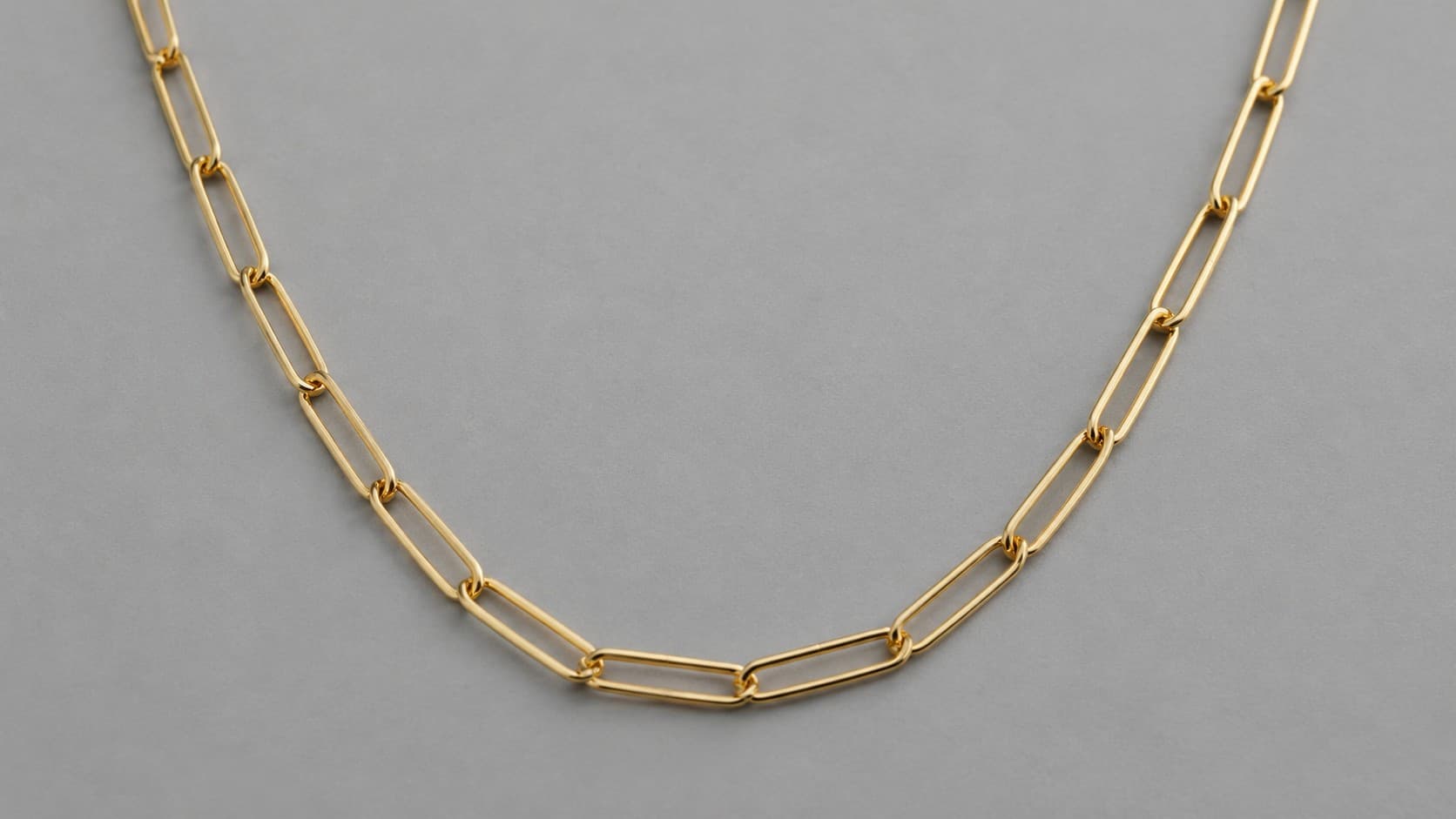 Gold paperclip chain necklace with elongated rectangular links