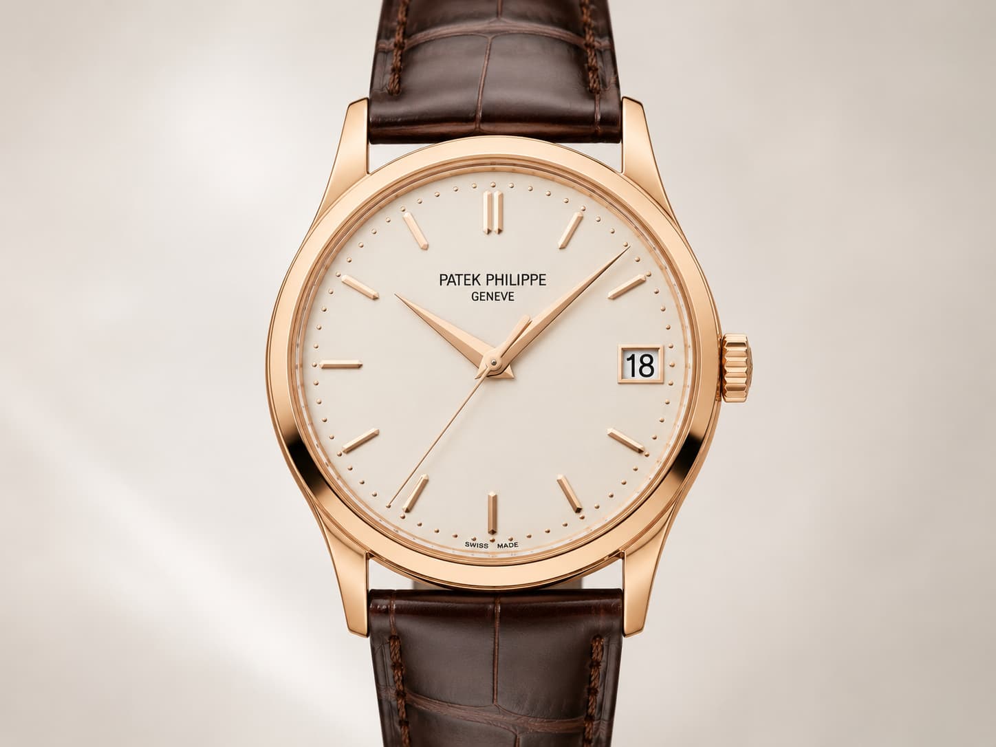 Patek Philippe Calatrava rose gold dress watch with brown leather strap