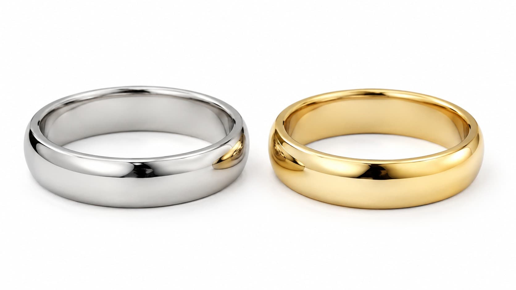 Platinum ring next to a gold ring showing color and finish comparison