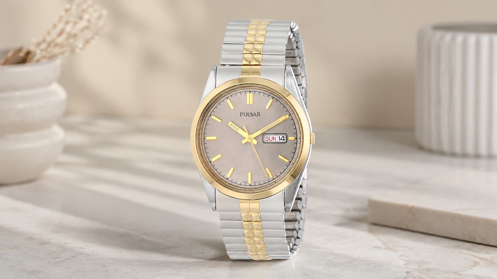 Pulsar PXF110 men's two-tone gold and silver watch with day-date dial