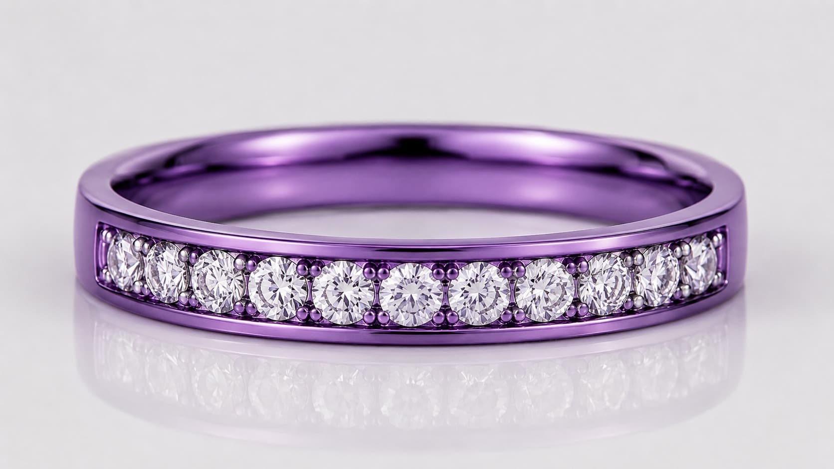 Purple gold ring band set with a row of round diamonds