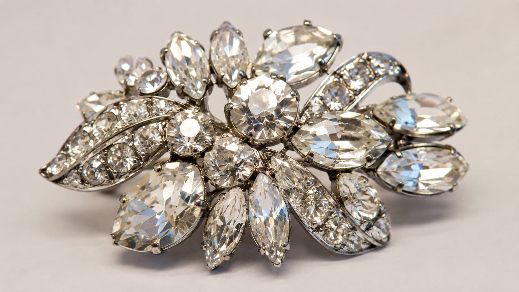 Sparkling silver rhinestone brooch with marquise-cut crystals, a classic 1950s jewelry design
