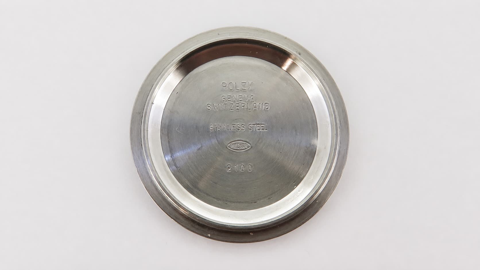 Rolex stainless steel caseback engraved with Geneva Switzerland text