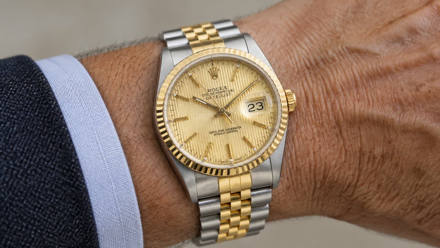 Two-tone Rolex Datejust 36 Ref. 16233 with champagne tapestry dial worn on the wrist
