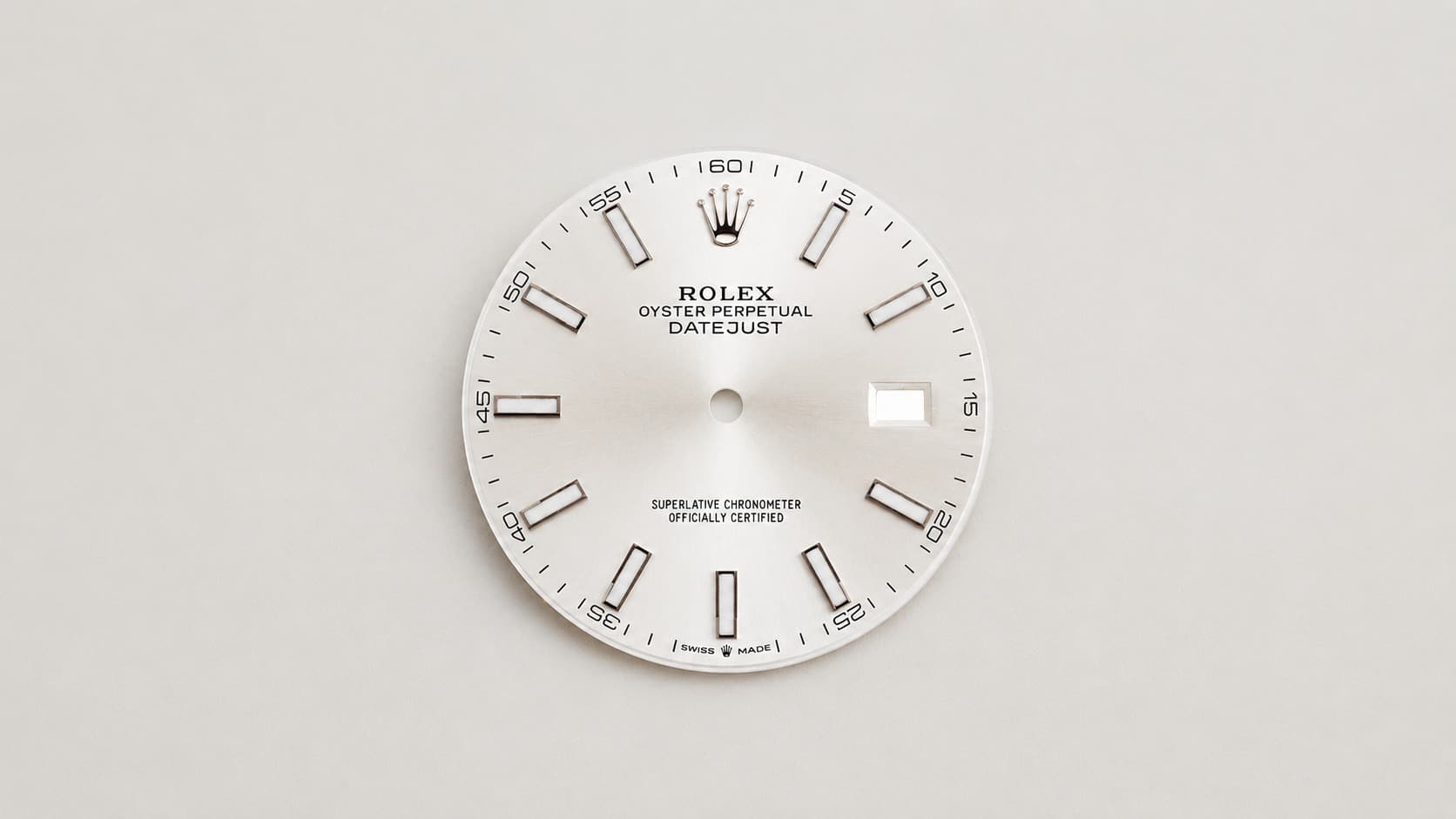 Rolex Oyster Perpetual Datejust dial with hour markers and crown logo
