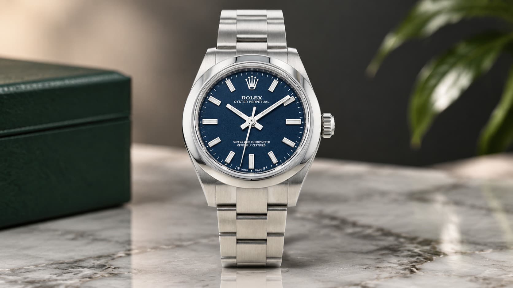 Rolex Oyster Perpetual 28 in steel with a blue dial, the brand's entry-level model