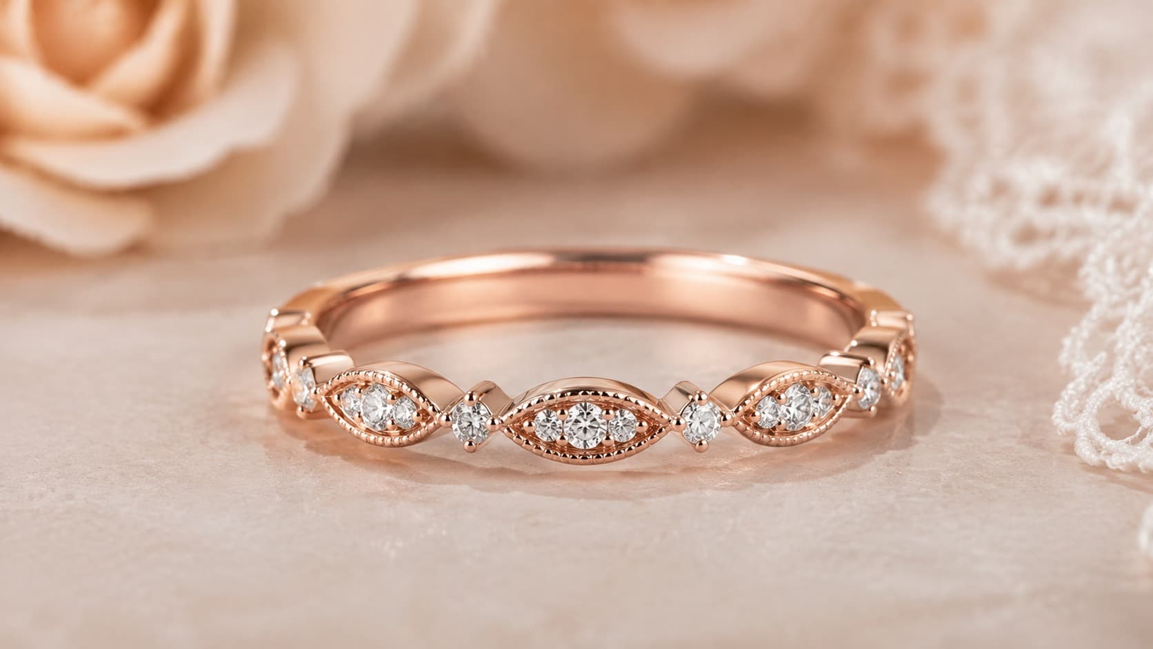 Rose gold vintage-style wedding band with marquise diamond details