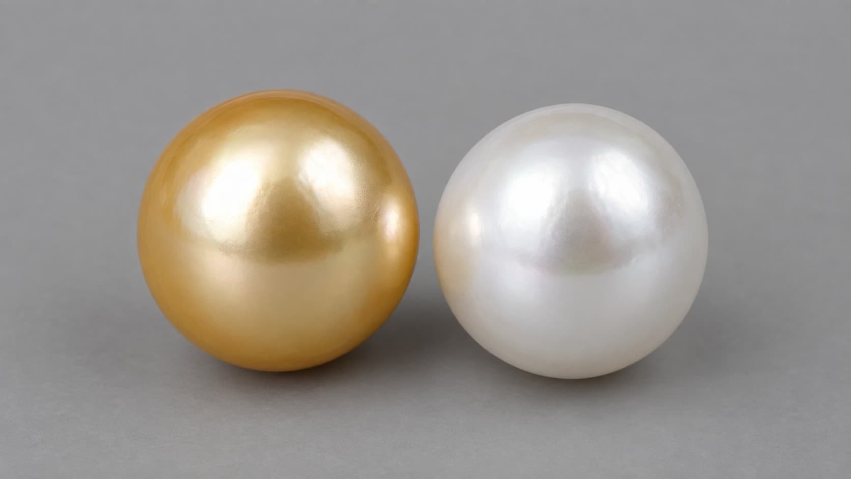 Golden and white South Sea pearls side by side