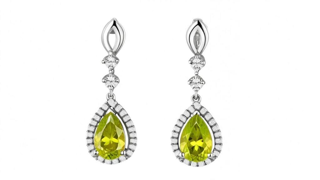 Elegant teardrop sphene earrings with white gold diamond halos highlighting gemstone fire