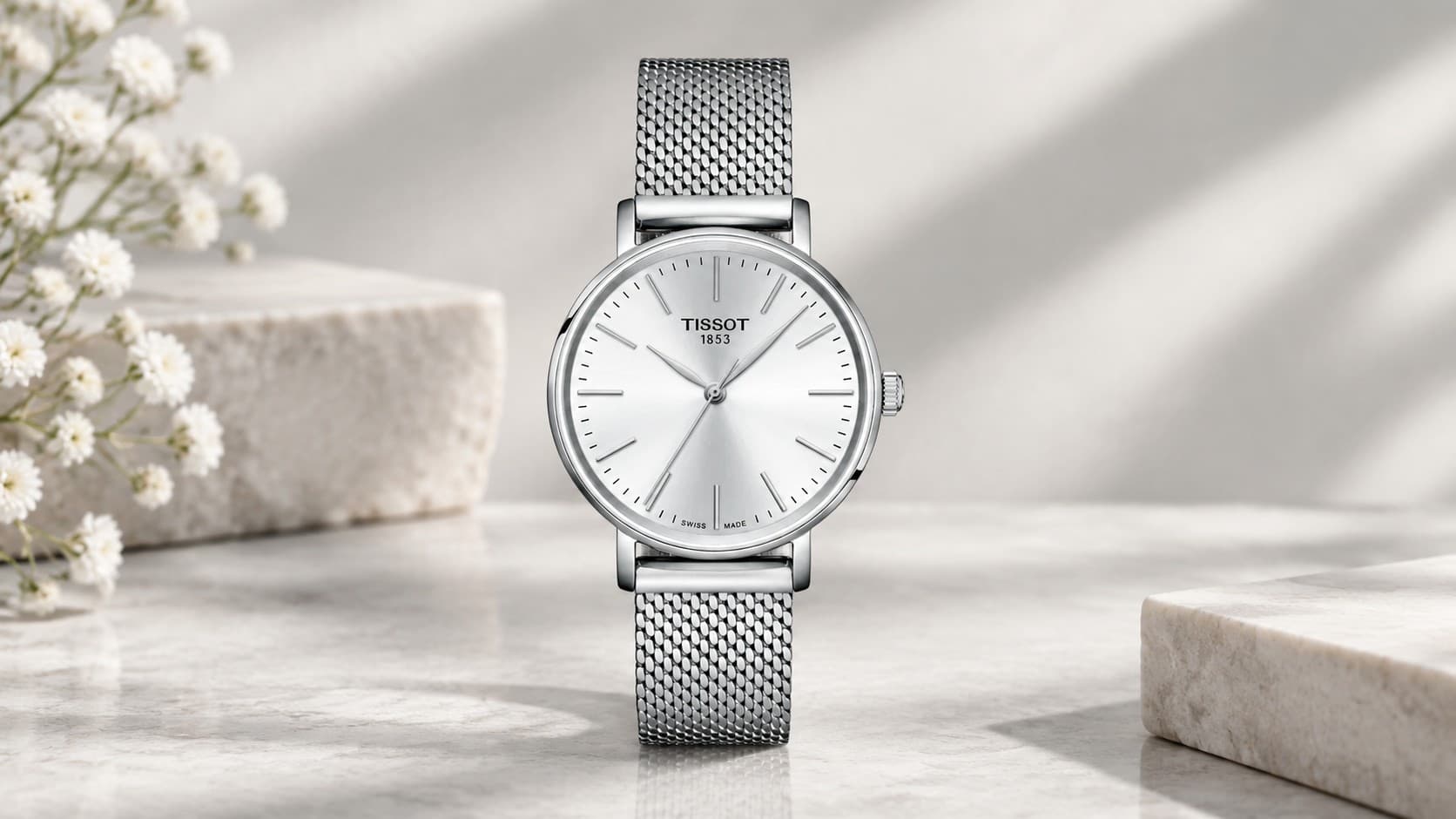 Tissot Everytime 34mm quartz watch with silver dial and steel mesh bracelet