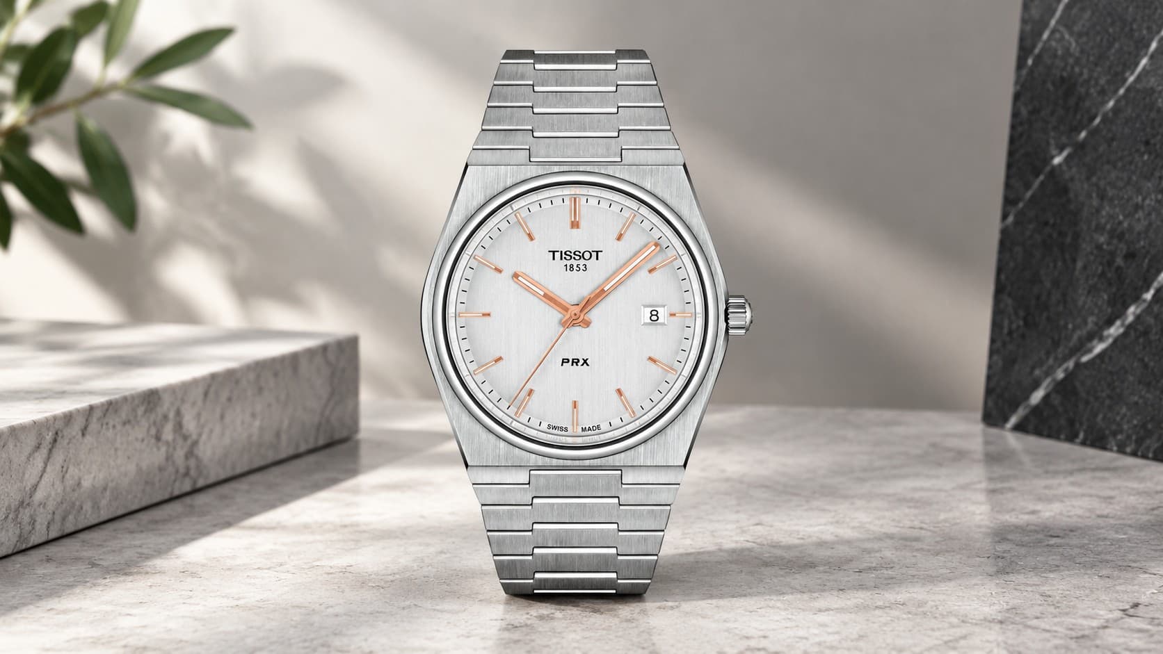 Tissot PRX 40mm steel watch with white dial and rose gold hands