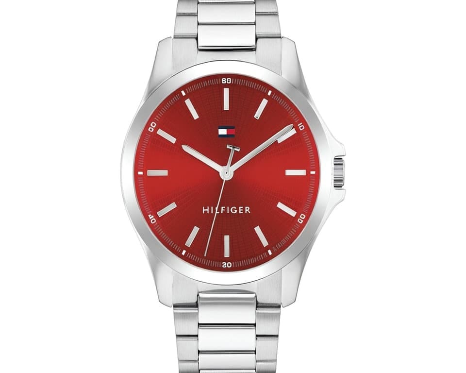 Tommy Hilfiger watch with red dial and stainless steel bracelet showing classic American preppy styling