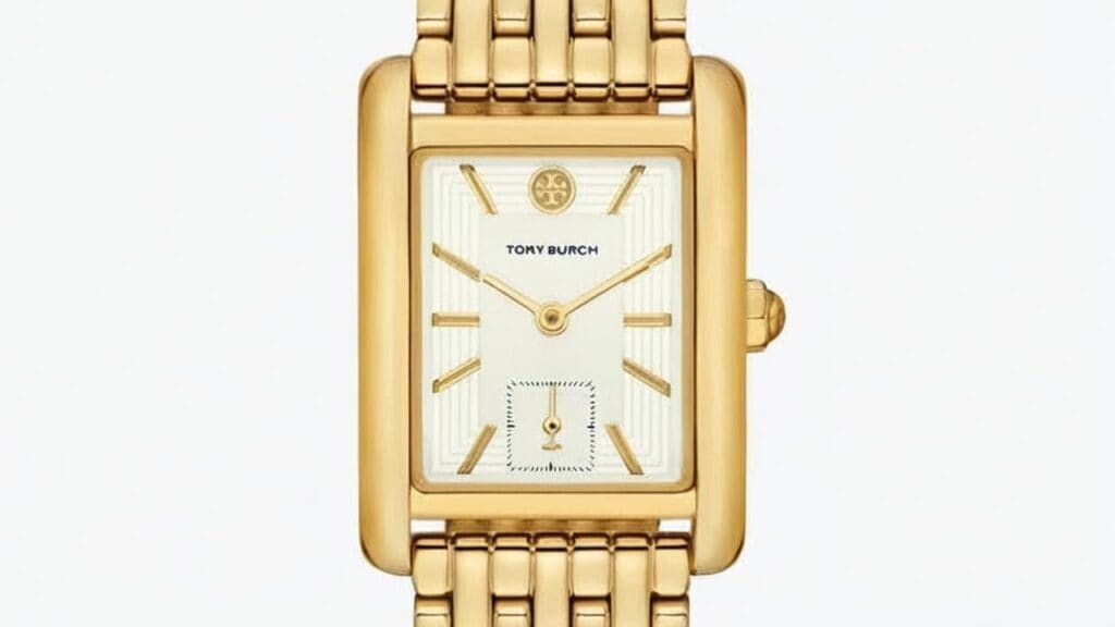Tory Burch rectangular watch with gold-tone metal bracelet and white dial showing classic design elements