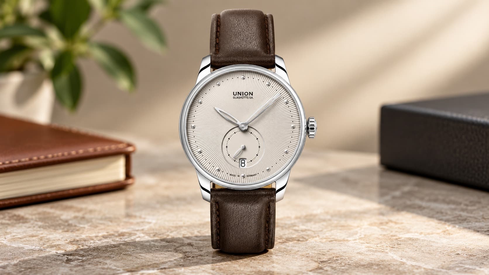 Union Glashütte Seris Small Second watch with cream dial, silver case, and brown leather strap