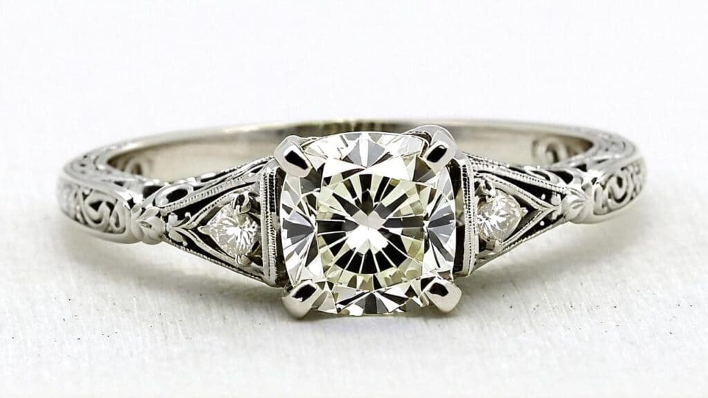 Vintage art deco diamond engagement ring with filigree details, commonly found in inherited jewelry collections
