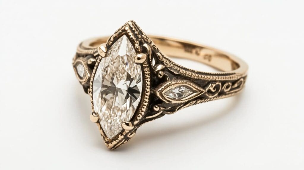 A vintage-inspired marquise cut diamond ring in rose gold, showcasing intricate filigree details and additional diamond accents for a timeless look.