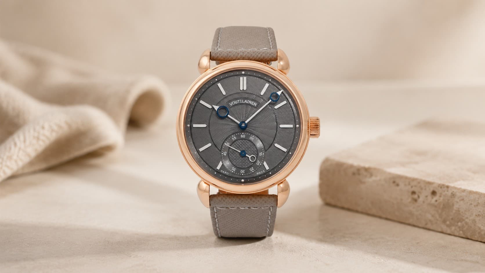 Voutilainen Vingt-8 rose gold watch with grey guilloché dial and power reserve