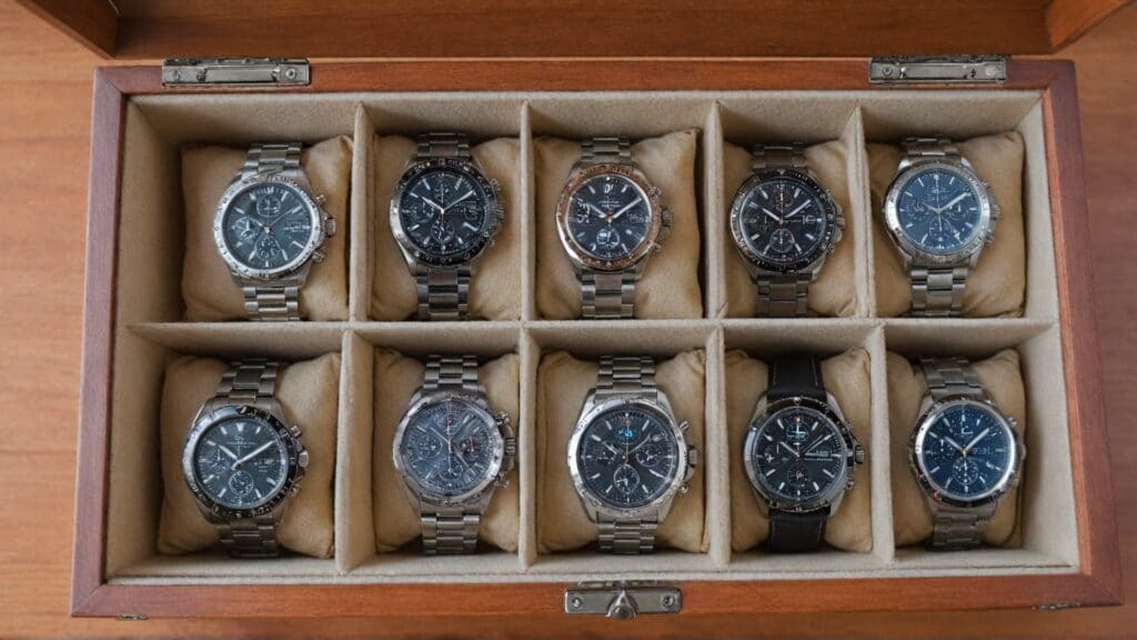 watch collection stored in protective wooden box with individual compartments for warranty protection