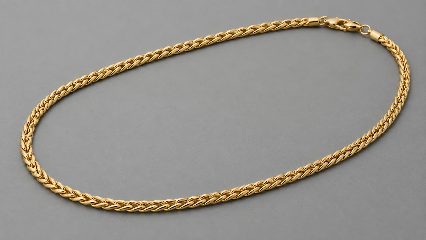 Gold wheat chain necklace with braided figure-eight links