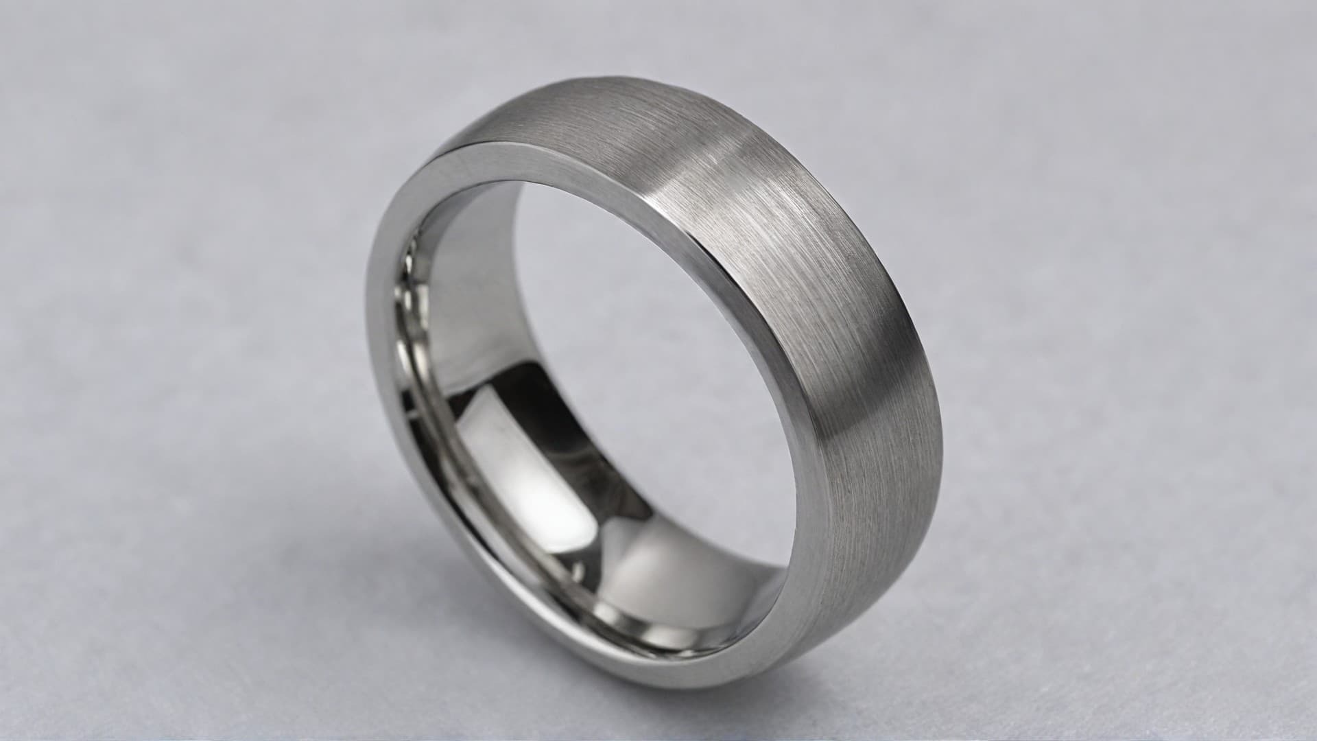 A brushed cobalt men's wedding band with a modern, silver-white finish, showcasing its durability and contemporary style.