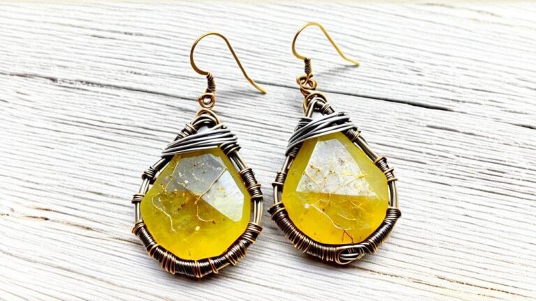 Teardrop-shaped yellow copal earrings with artistic wire wrapping, combining rustic charm with natural resin aesthetics