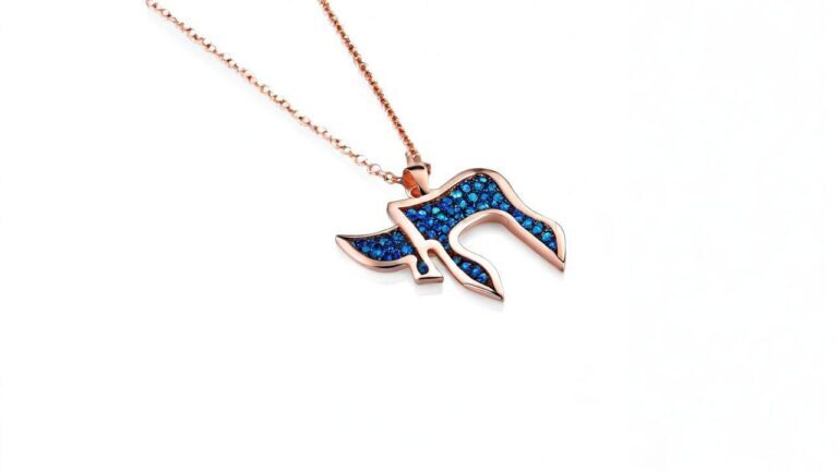 Rose gold Chai symbol necklace with blue gemstone inlay representing Hebrew letters for life