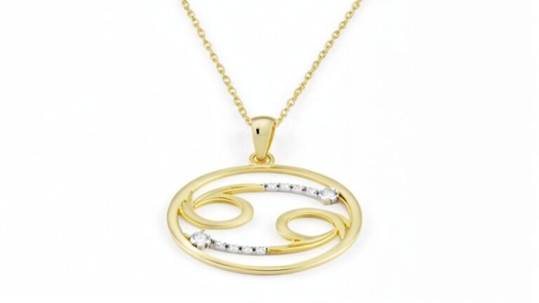 Gold Cancer zodiac symbol pendant with diamond accents in an elegant oval design