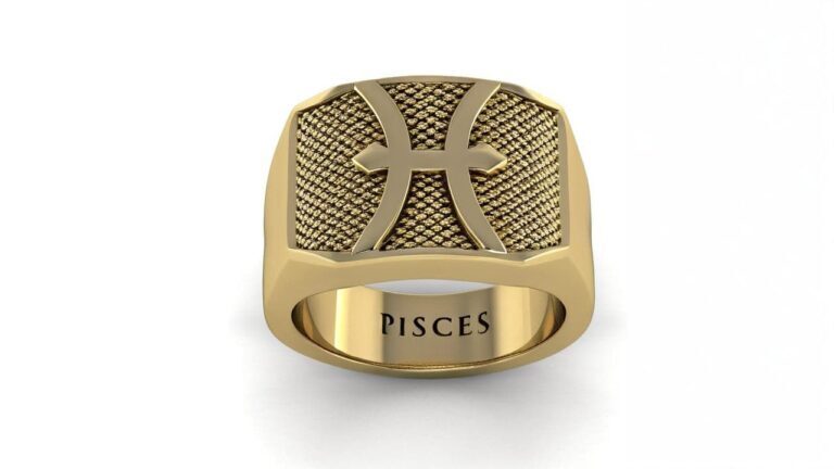 Pisces zodiac ring in gold with textured background and raised fish symbol engraving