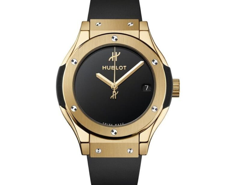 Hublot gold luxury watch with black dial and signature rubber strap representing the Art of Fusion philosophy