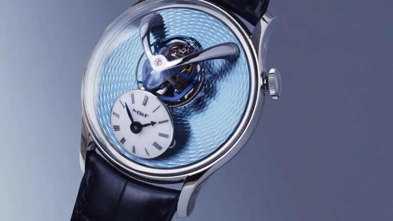 MB&F Legacy Machine watch featuring flying tourbillon with blue guilloché dial and Roman numeral subdial showcasing horological innovation