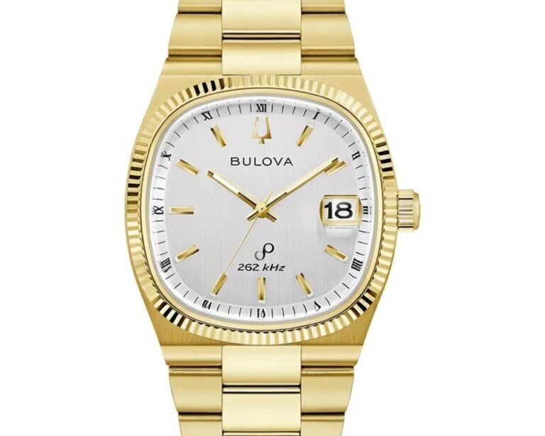 Bulova Precisionist watch in gold with 262 kHz movement, fluted bezel, and date display showing advanced quartz technology