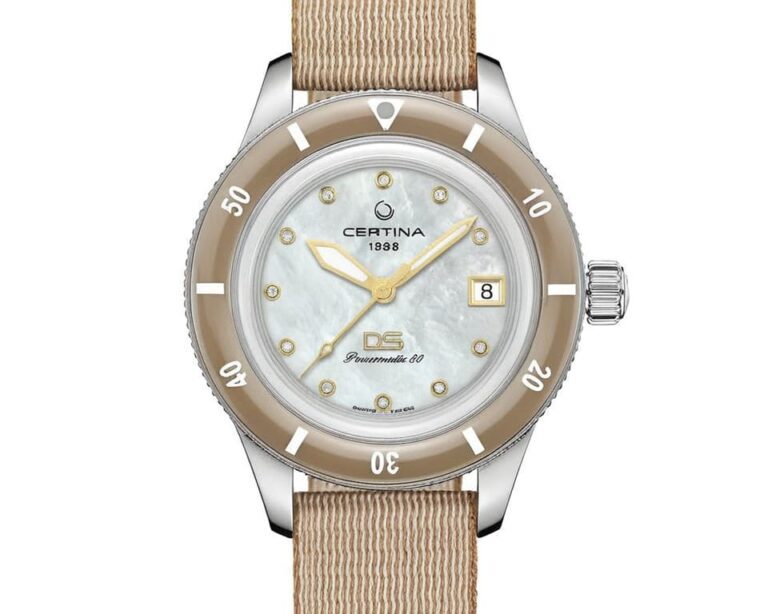 Certina DS Action Diver watch with mother of pearl dial gold hands and markers beige NATO strap showcasing Swiss diving watch elegance