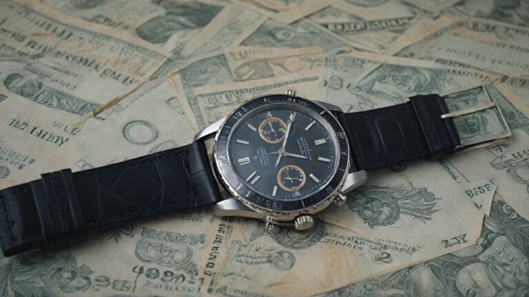 Luxury watch with money illustrating financial risks and investment losses associated with buying fake or counterfeit timepieces