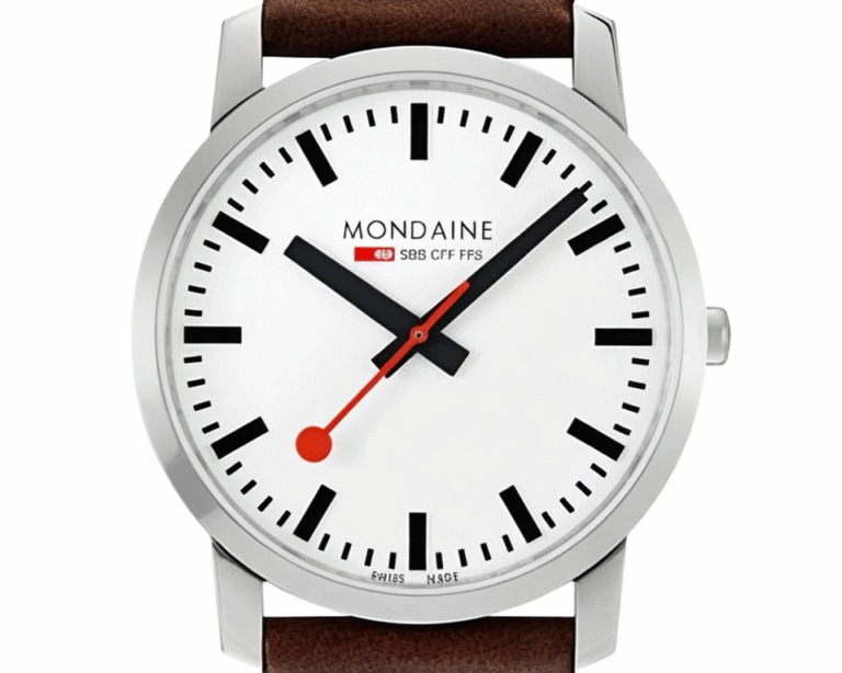 Mondaine SBB Swiss Federal Railway watch with white dial, iconic red second hand, black rectangular markers, and brown leather strap representing classic Swiss railway clock design