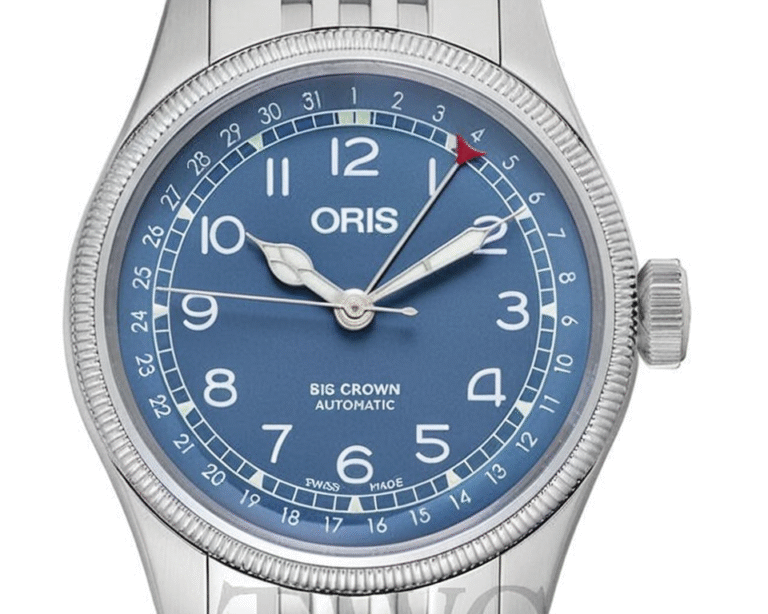 Oris Big Crown Automatic watch featuring blue dial with pointer date function and stainless steel bracelet demonstrating modern Swiss craftsmanship