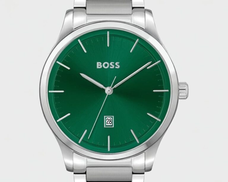 Boss watch with striking green dial, stainless steel bracelet, and date window at 6 o'clock position showing modern minimalist design