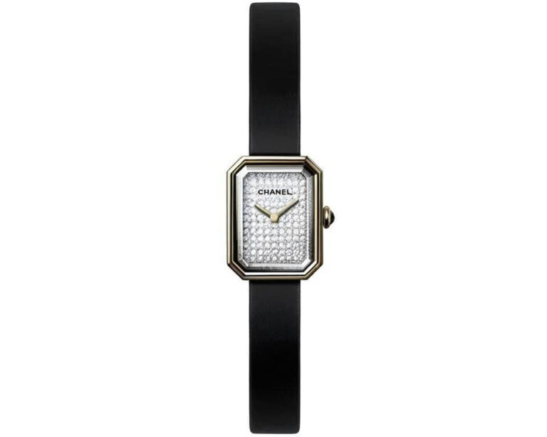 Chanel Première watch featuring full diamond pavé dial, 18k gold octagonal case, and black leather strap showcasing luxury jewelry watchmaking excellence
