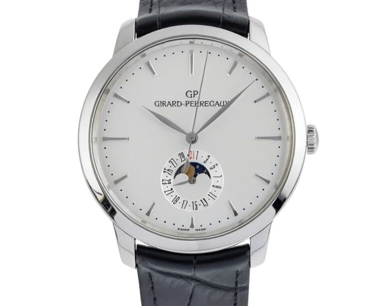 Girard Perregaux 1966 collection moonphase watch in white gold with silver dial and black alligator leather strap displaying lunar complication